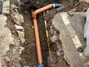 Broken pipe replacement in Kensington.