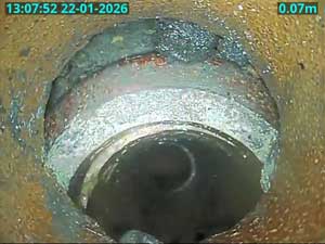 A displaced joint dropped section of drain.