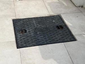 A new drain cover in Cricklewood