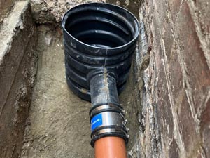 A new surface water gully by professional drain installers in Willesden.
