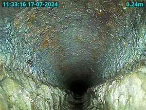 A cast iron underground drain that requires a descaling clean