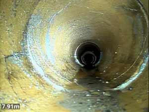 A CCTV drain survey showing a cracked pipe in Chiswick