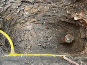 Excavation and replacement of broken pipes in Edgware.
