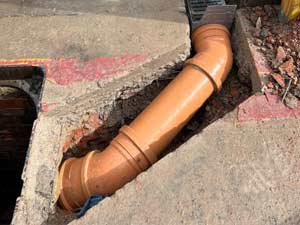 A new channel Drain Pipe installed for a premises in Ealing